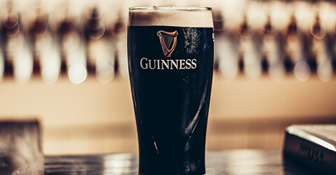 Guinness pioneers sustainable brewing through regenerative agriculture, reducing carbon footprint and fostering biodiversity. Join the movement for a greener future!