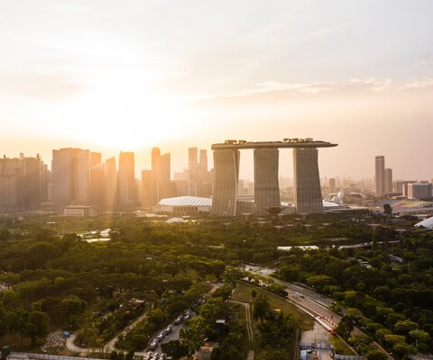 Discover Singapore's pioneering net-zero solutions, from innovative undersea cables to district cooling and offshore solar farms.